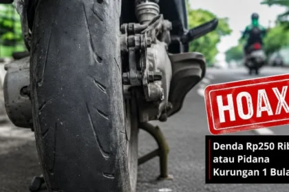Ilustrasi sepeda motor dengan ban gundul.